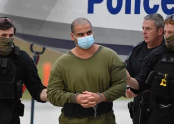 Captured fugitive Mostafa Baluch arrives back in Sydney.(AAP: Mick Tsikas)