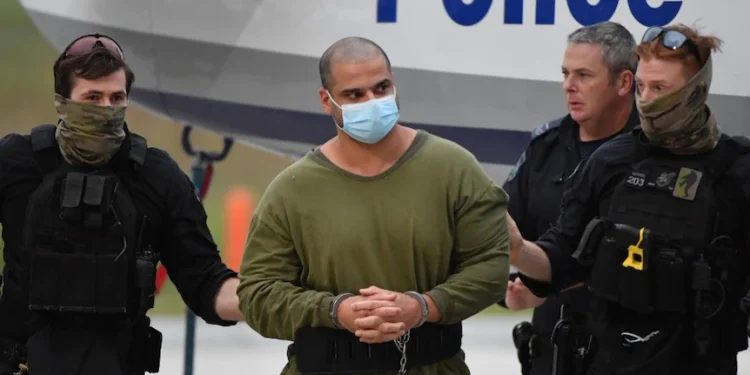 Captured fugitive Mostafa Baluch arrives back in Sydney.(AAP: Mick Tsikas)