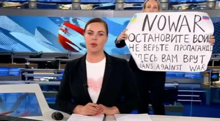 Marina Ovsyannikova stormed the Russian TV News program holding a sign against the war in Ukraine.