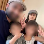 Shari Baloch with her husband and children whose faces have been blurred [Courtesy of Haibatan Baloch]