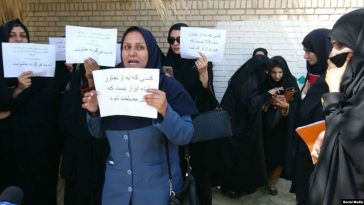 A group of women stage a protest in Iranshahr, Iran, June 19, 2018, to call on authorities to prosecute those responsible for an alleged recent wave of gang rapes in the southeastern city.