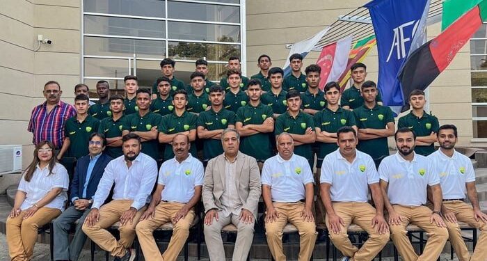 Pakistani team participating in the South Asian Football Federation's (SAFF) Under-16 Championship pose for a picture with team officials. PHOTO: AFP