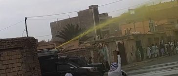 An image provided by an eyewitness on Friday 20 October 2023 shows a water cannon spraying yellow liquid to disperse protests and facilitate subsequent arrest of marked protesters.